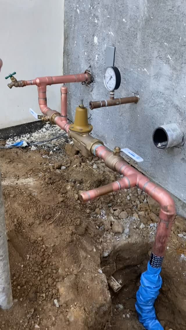 New main water line in a dug trench
