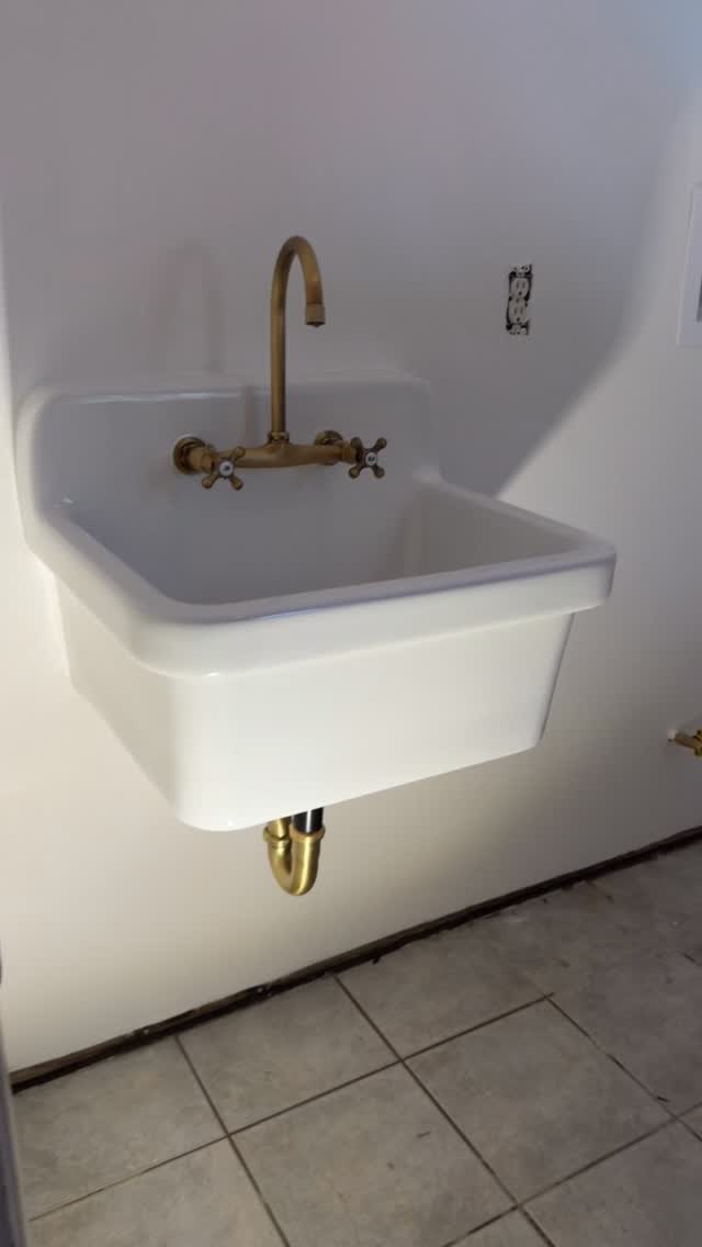 Wall-mounted sink with new brass faucet